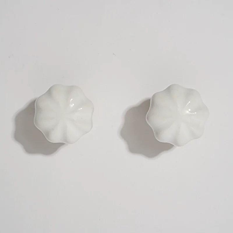 White Ceramic and Brass Handle Pull