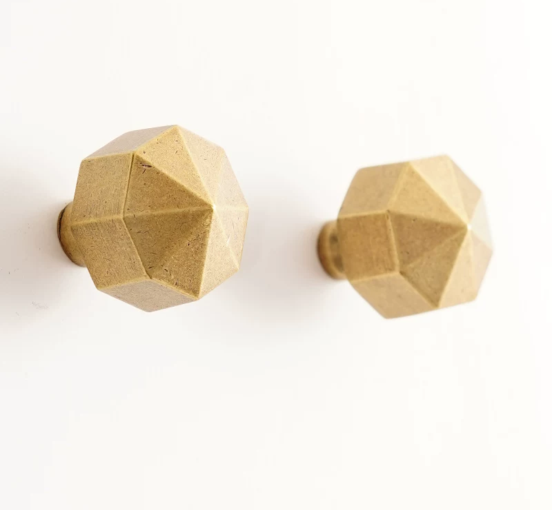 Single-Hole Imitation Brass Handle for Cabinet, Drawer, or Wardrobe in use