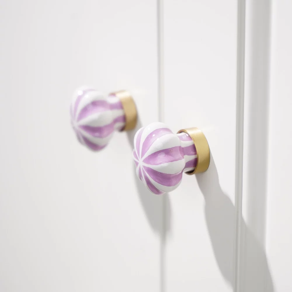Round Brass and Ceramic Single-Hole Wardrobe Door or Drawer Pull, 1 Piece in use